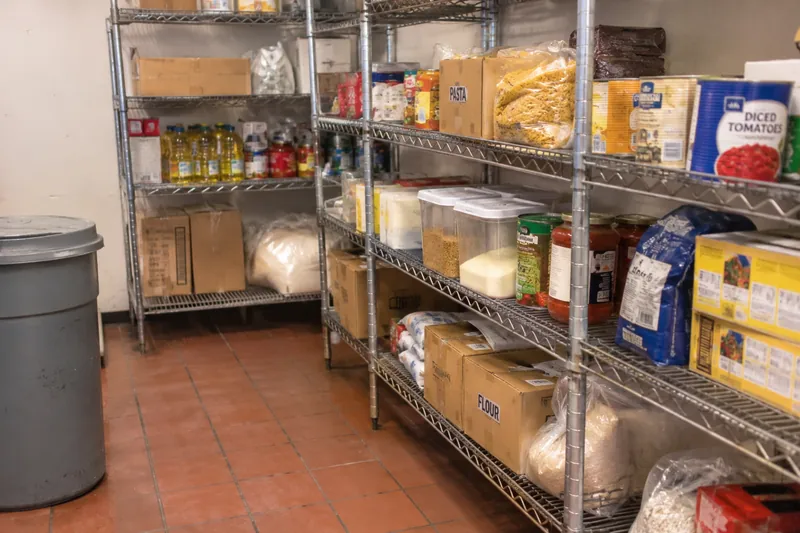 Dry storage shelves in a restaurant kitchen